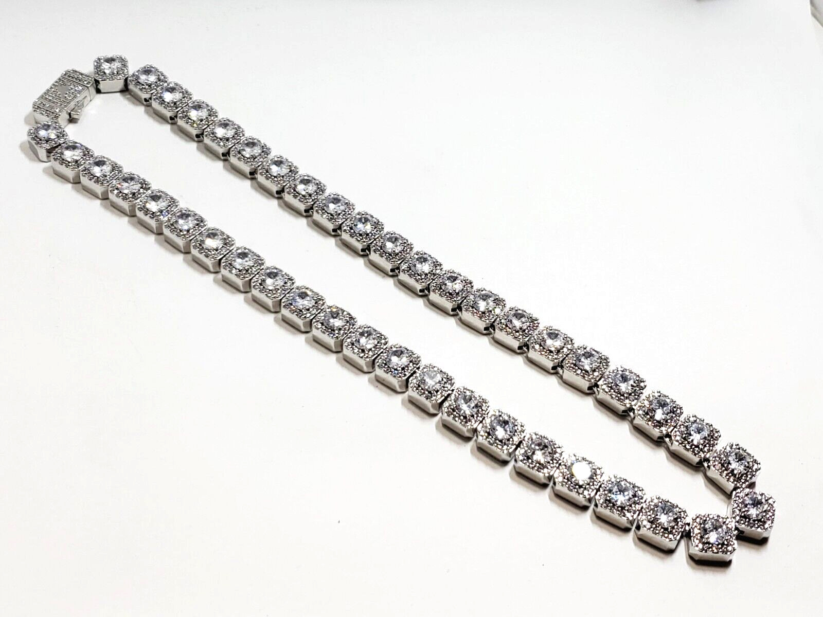 The Jewelry Plug Clustered Tennis Necklace in White Gold Plating