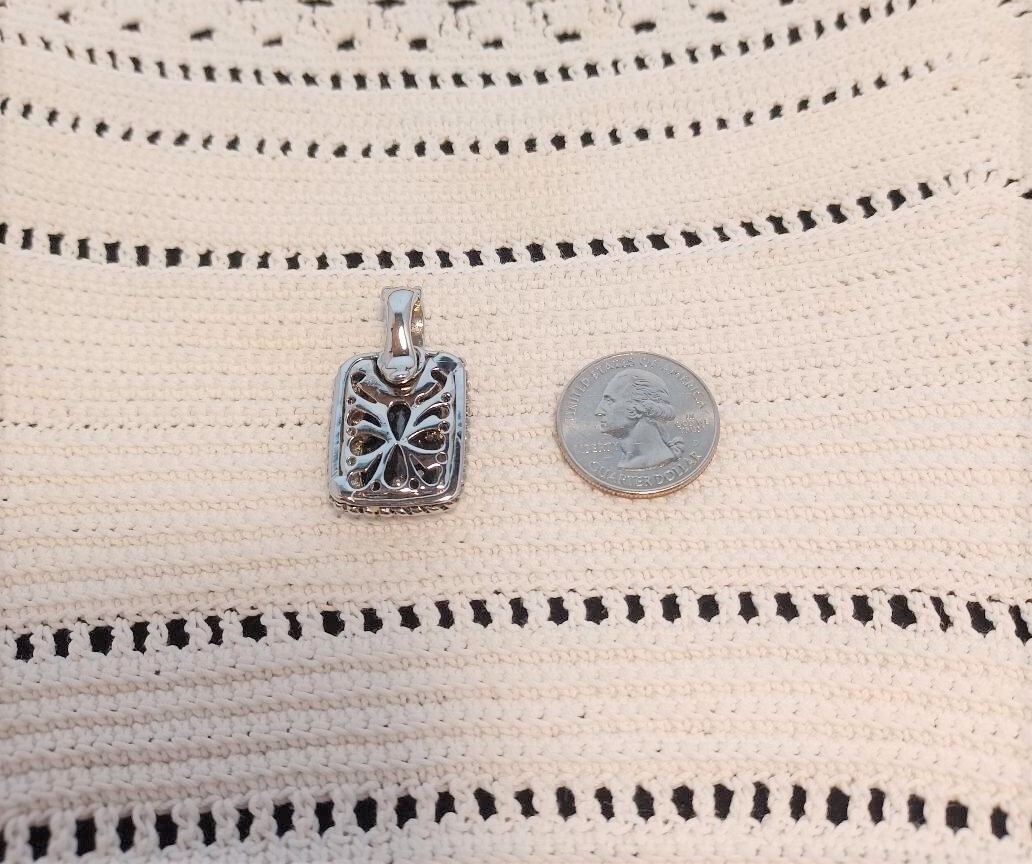 Black Faceted Glass and Silver Tone Pendant