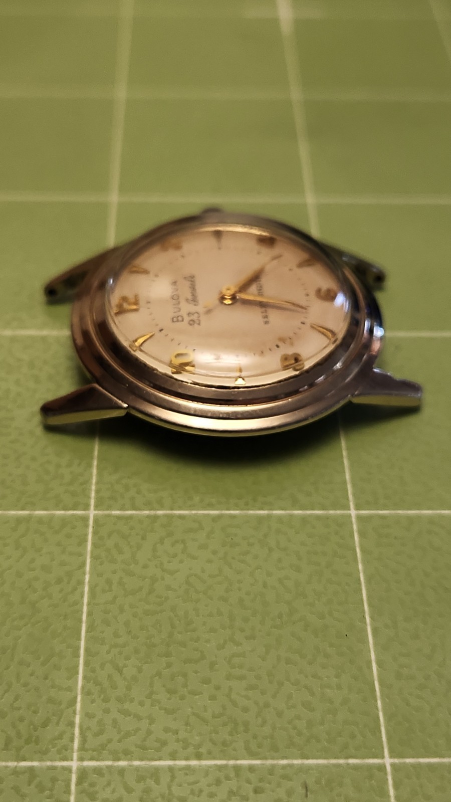 Bulova 23 Jewels Self-Winding Automatic Vintage 1960s White Dial 10kgf Bracelet.