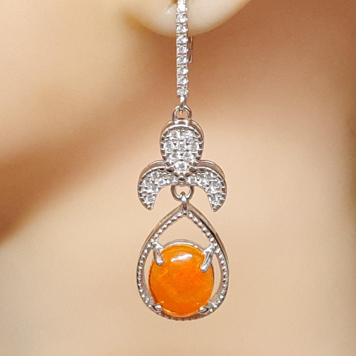 World Class 9.54ctw Orange Opal & White Sapphire 925 Silver Dangle Earrings