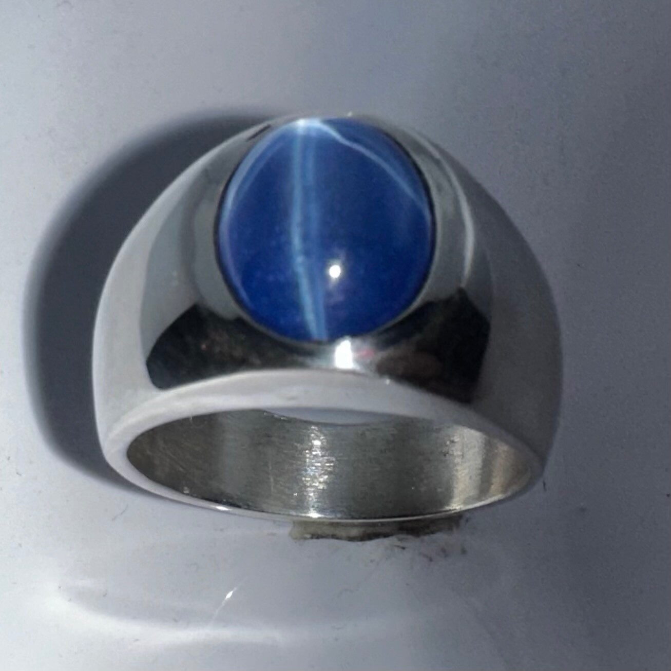 MJG STERLING SILVER BEZEL RING. 12 x 10mm OVAL LAB STAR SAPPHIRE. SZ 9.5