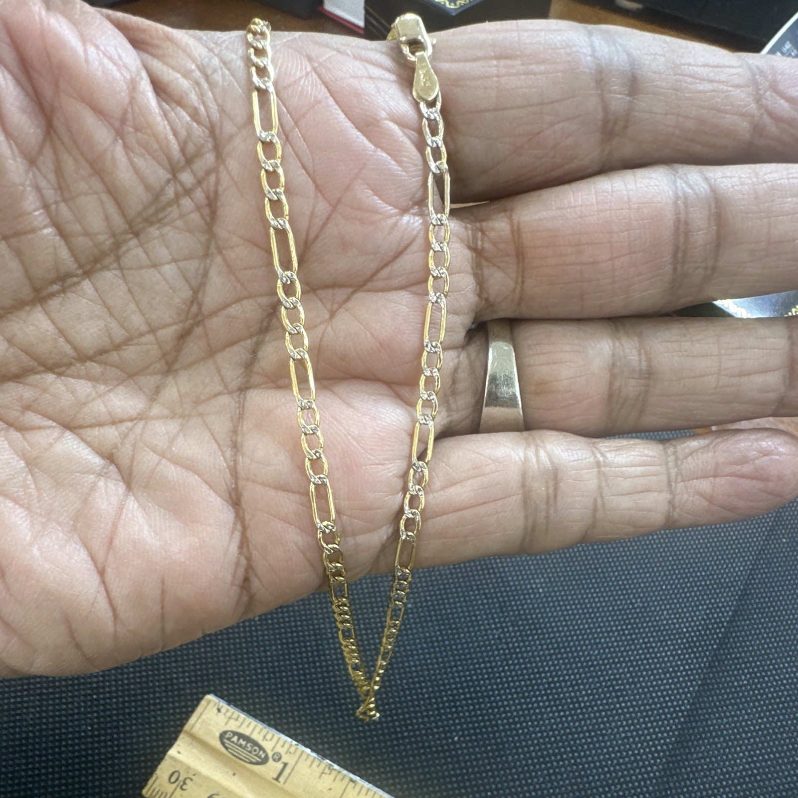 14 k solid Gold 18inches Figuro Diamond cut Chain.