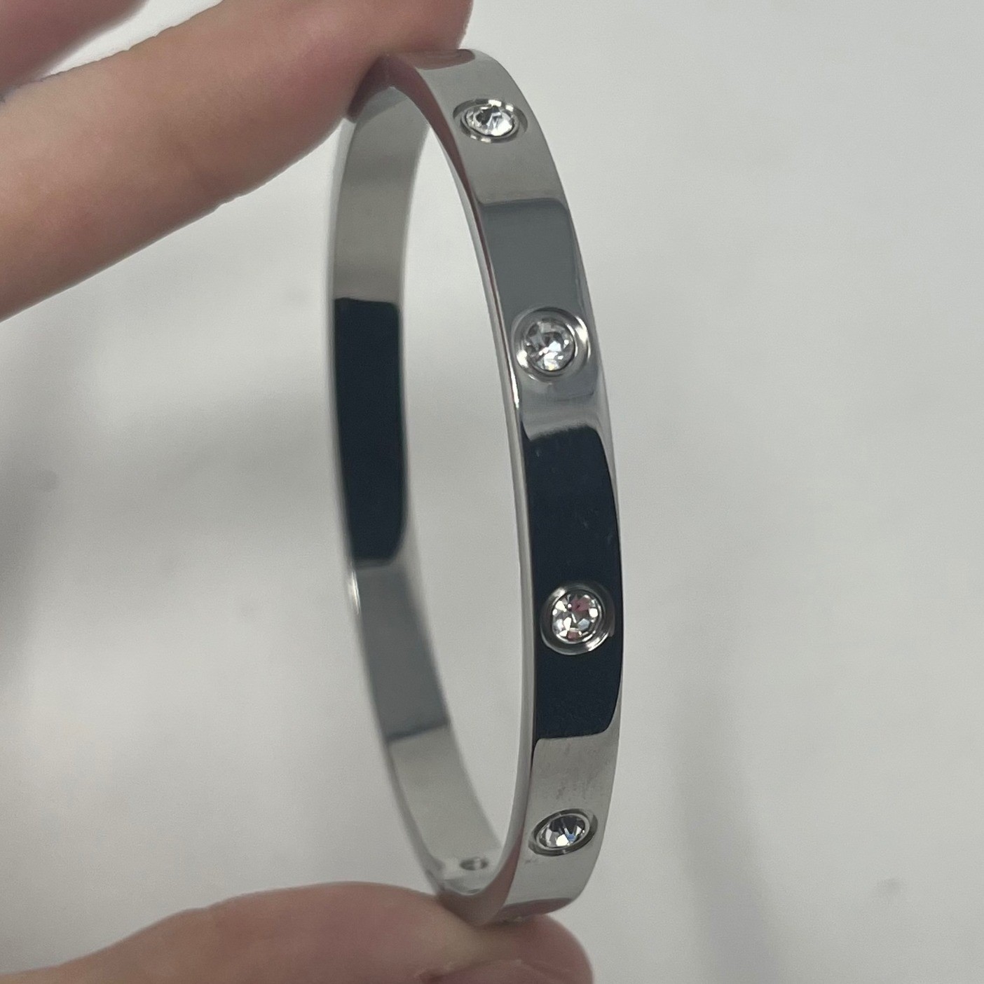 PAVOI Silver Tone Cubic Zirconia Hinged Bangle Bracelet Screw Motif