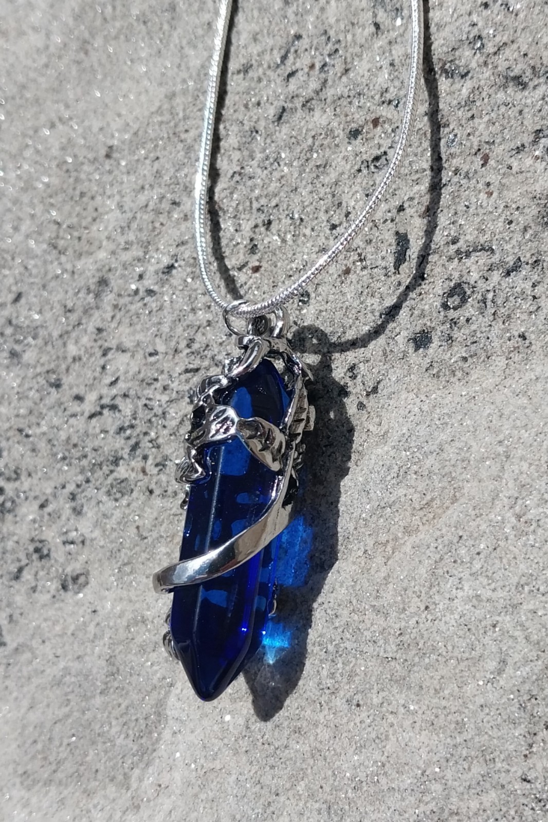Flower Wrapped Blue Crystal Pendant Necklace