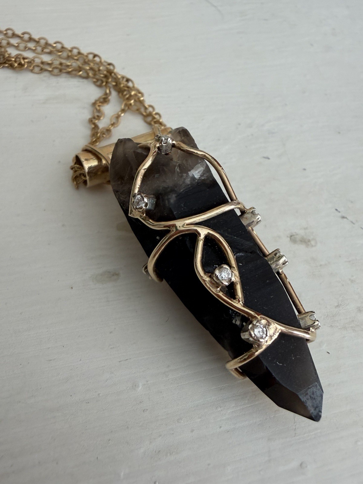 Terminated smoky quartz,wire wrapped in gold with diamond accents, pendant only
