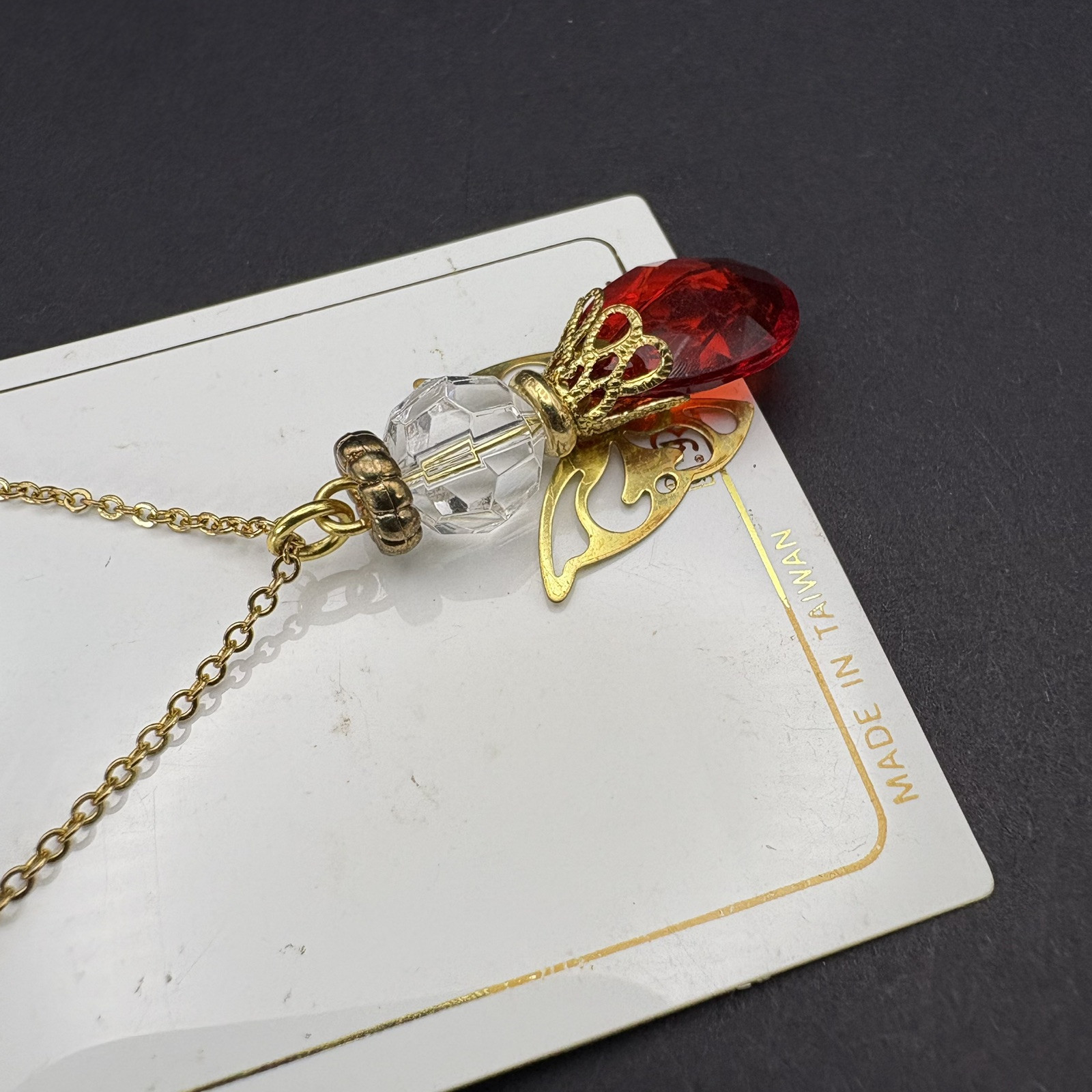 Roman Inc. July Birthstone Faux Ruby Pendant Necklace Gold Tone Angel Charm