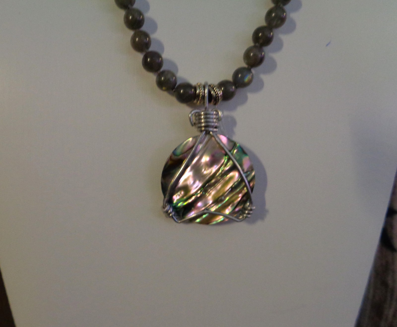 Artisan crafted, gorgeous, aluminum wrapped Paua pendant, on 19” Labradorite str