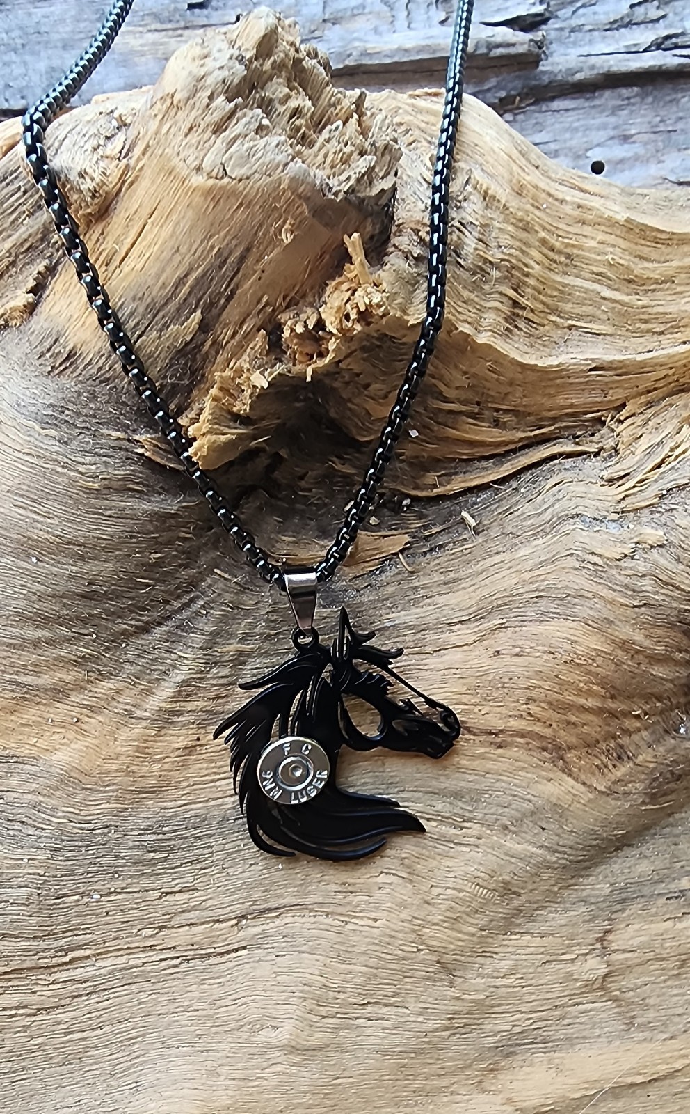 Black Stainless Horse Necklace with Nickel 9 mm Bullet Casing. Optional Color