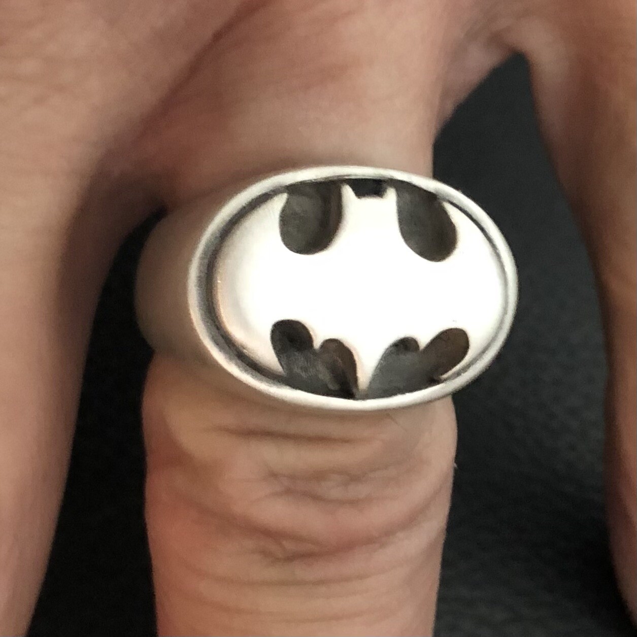 MJG STERLING SILVER OVAL BATMAN RING. STARTS AT SIZE 10
