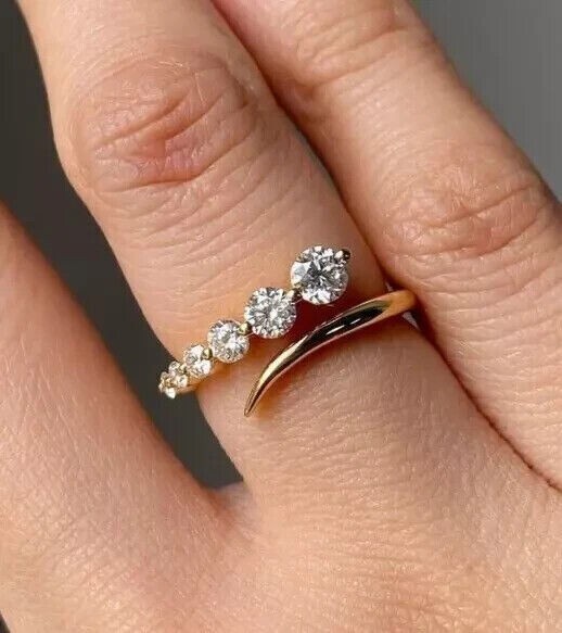 0.18 CT Round Cut EF VSSI Lab Grown Diamond Women’s Bypass Ring 14K Yellow Gold