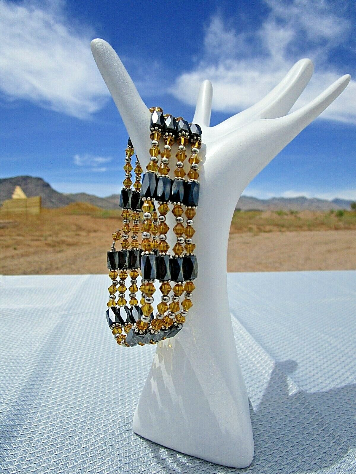 H.C. Magnetic Wrap, 36″, Amber & Hematite Beads, Gold Tone Spacers