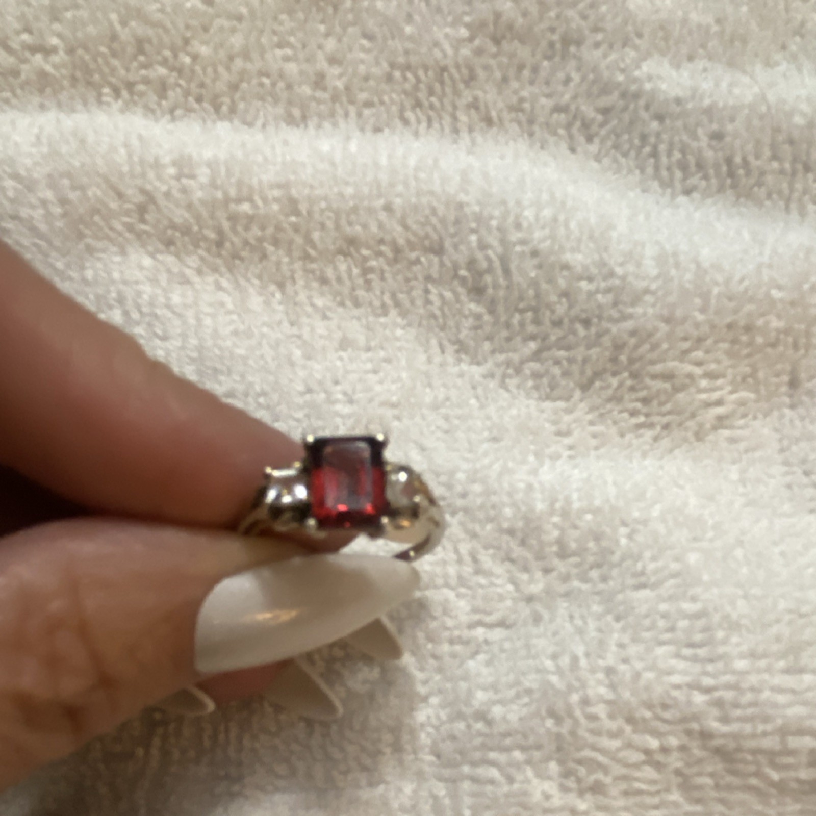 925 s.s. Emerald cut garnet with clear square stones 6 1/2 size