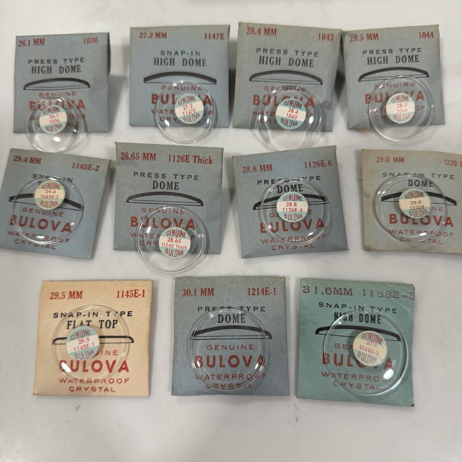 Lot Of 11 Genuine BULOVA Dome Type Watch Crystals 26.1-31.6mm NEW OLD STOCK!