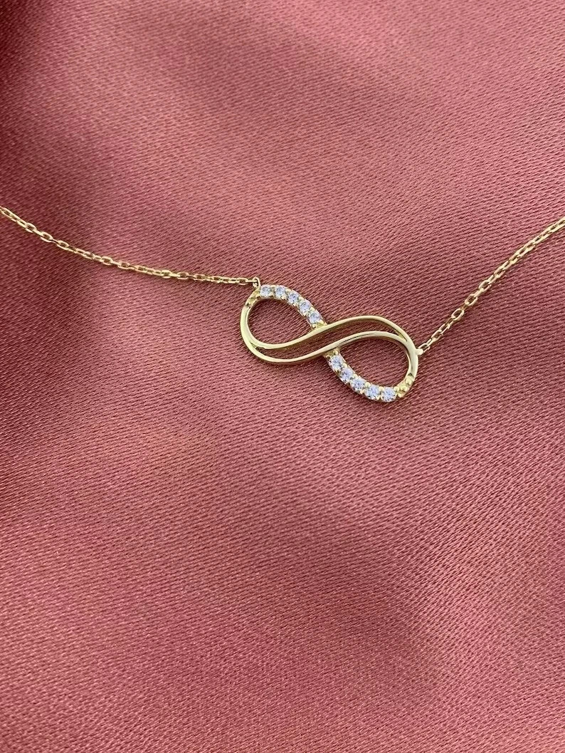 Round Cut Simulated Diamond Stunning Infinity Pendant In 14K Yellow Gold Plated