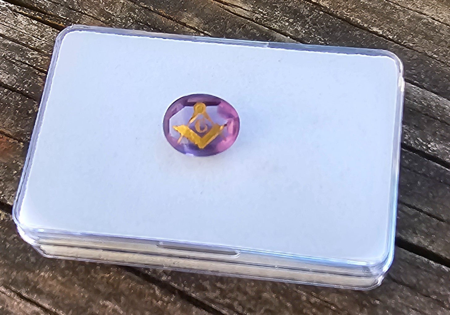 Amethyst 11.4×9.5mm Oval Loose Stone with Mason symbol