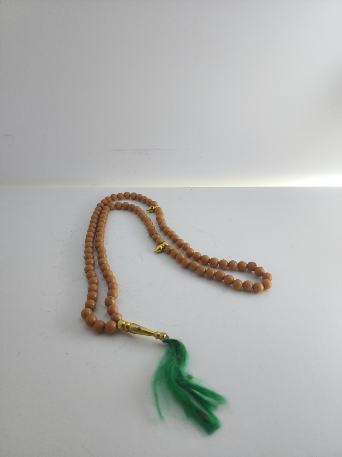 Brown Beige Beads Necklace Meditation Souvenir Green Tassel Gold Tone Charm