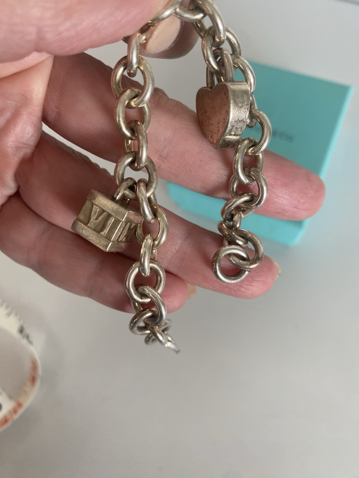Tiffany & Co. Sterling Silver Charm Bracelet with 2 Charms Length 71/2 Inches