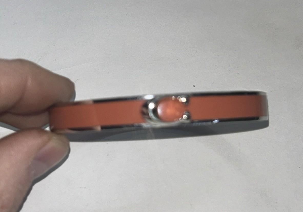Coach Signature C Logo Hinged Bangle Bracelet in Orange Enamel & Silver