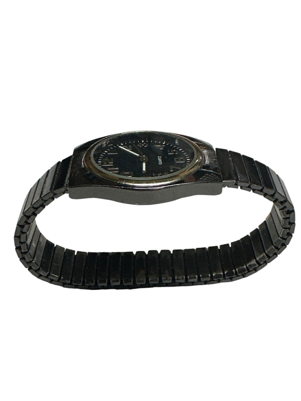 Vintage Accutime Watch Corp WMM2002 0317 – Silver Tone Stretch Band