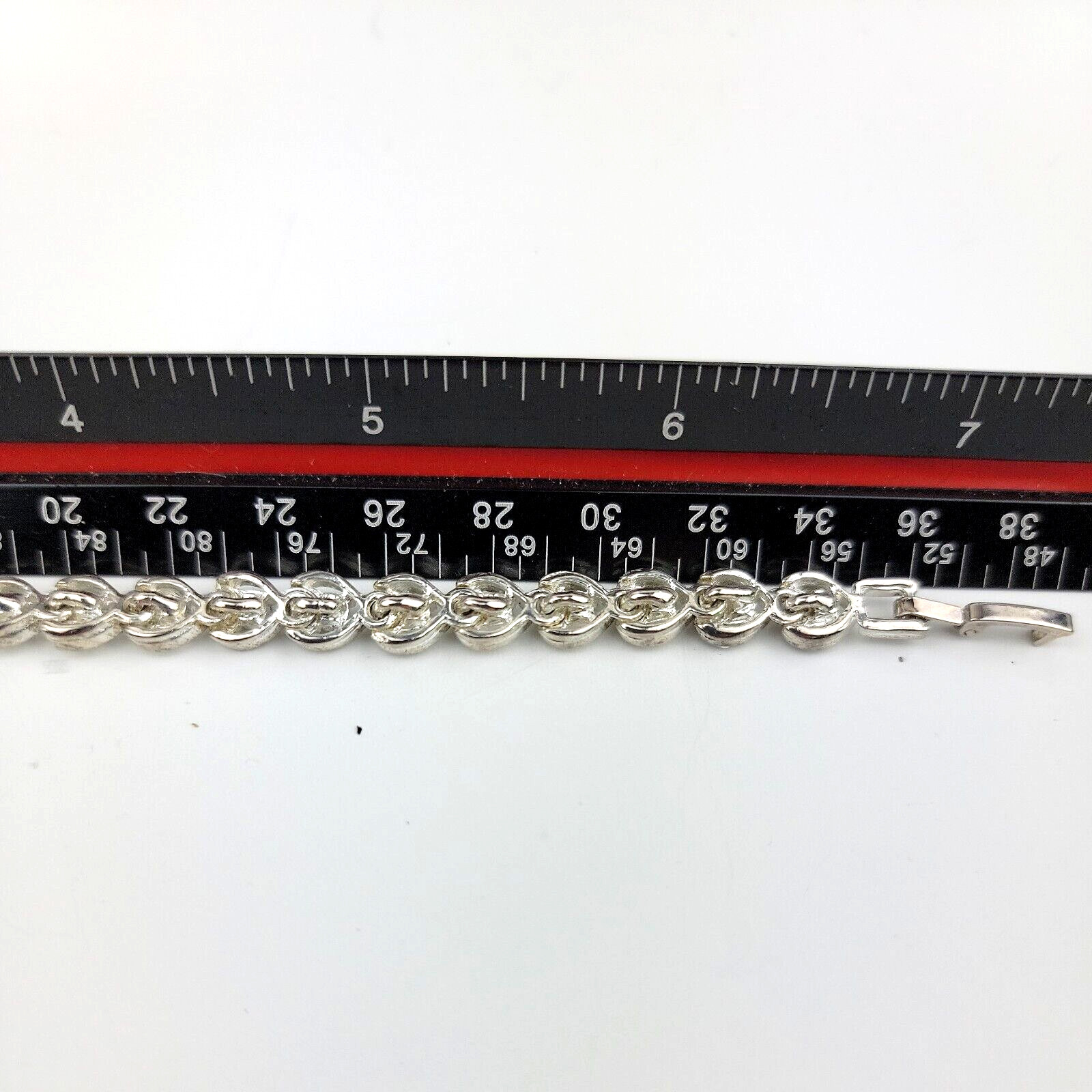 Heart Shaped Tennis Bracelet Silver Tone Link with Rhinestones Fold Over Clasp