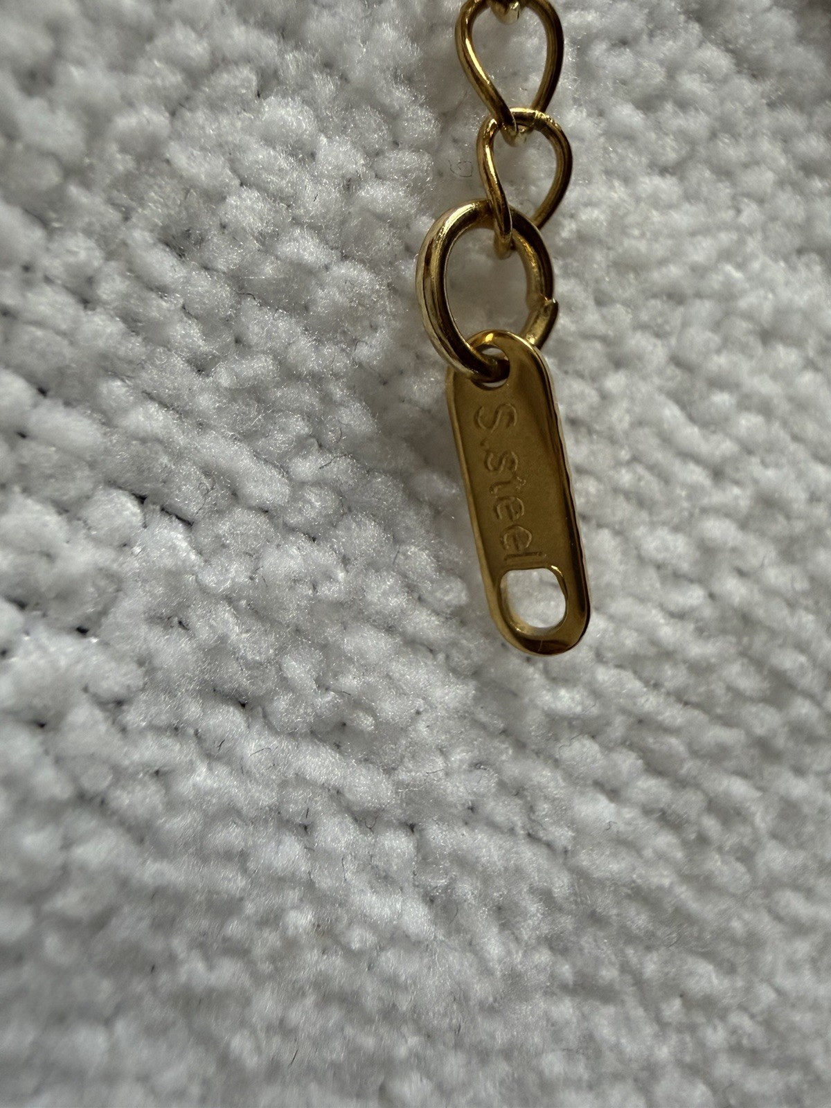 7” with 2” ext Gold over S. steel, stamped Tennis Bracelet