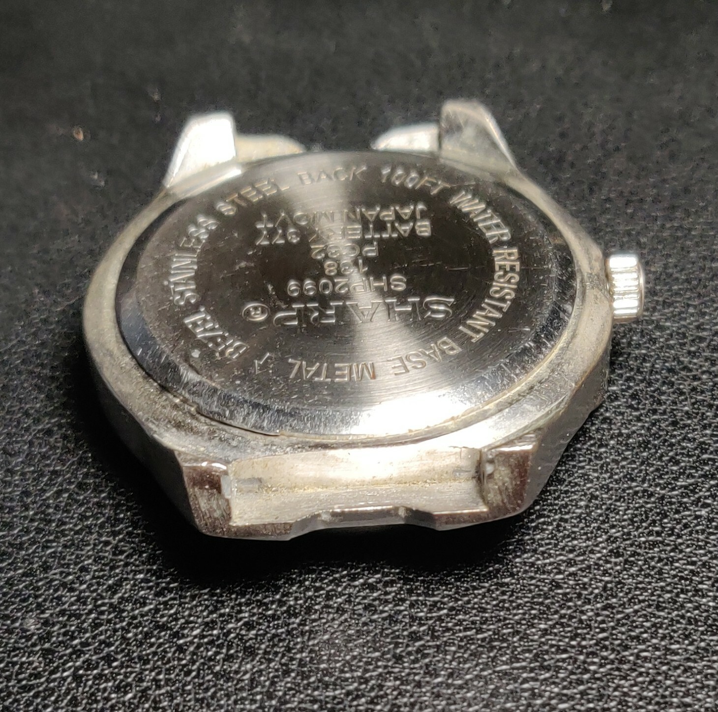 Sharp SHP2099 Silver Tone Seiko Instruments Inc. PC21A Quartz Movement No Band