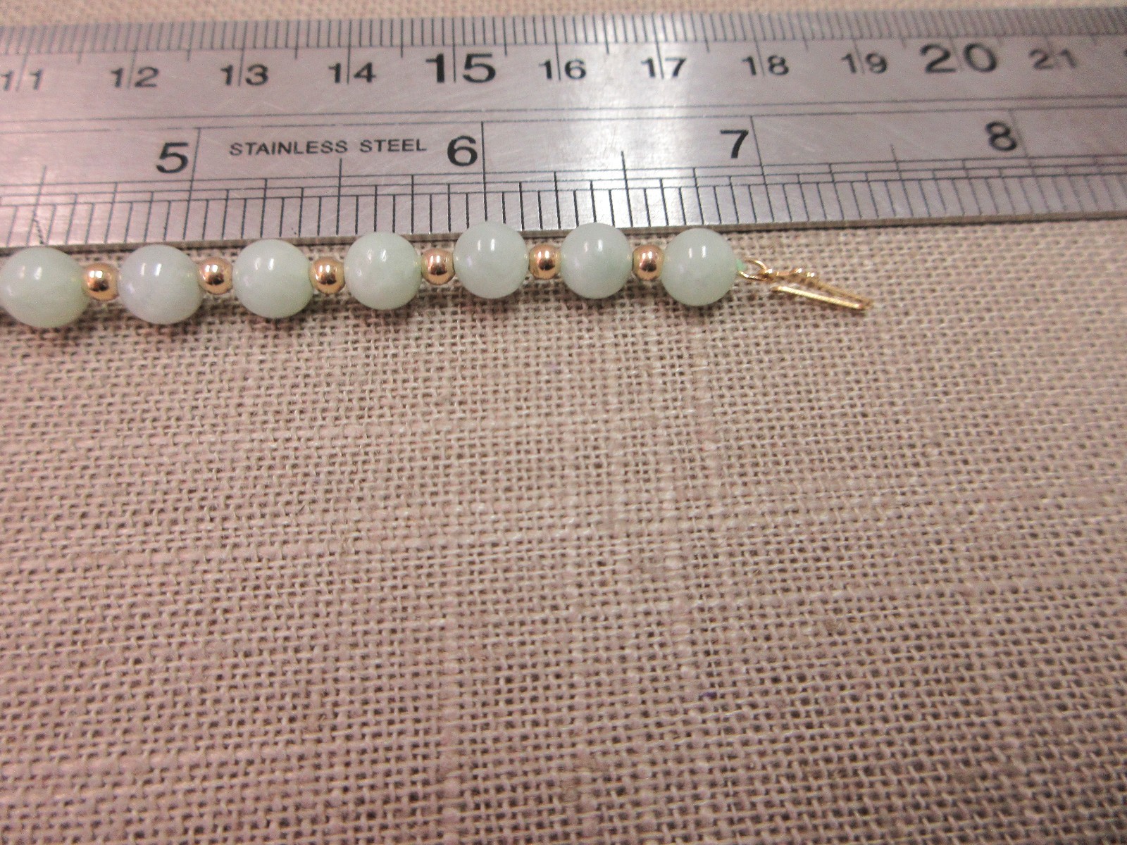 6 7/8″ 14k Foam Green Jade Beads 14k gold beads Bracelet 8.22 Grams