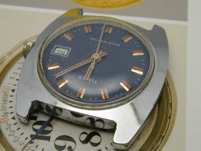 VINTAGE 1960S TIMEX BLUE DIAL RED HANDS AND MARKERS WRIST WATCH