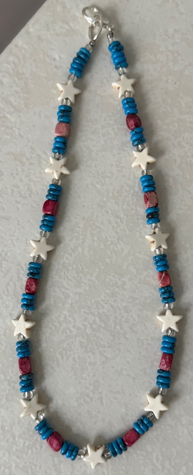 Handmade turquoise disc, white star, red stone and clear glass beads necklace