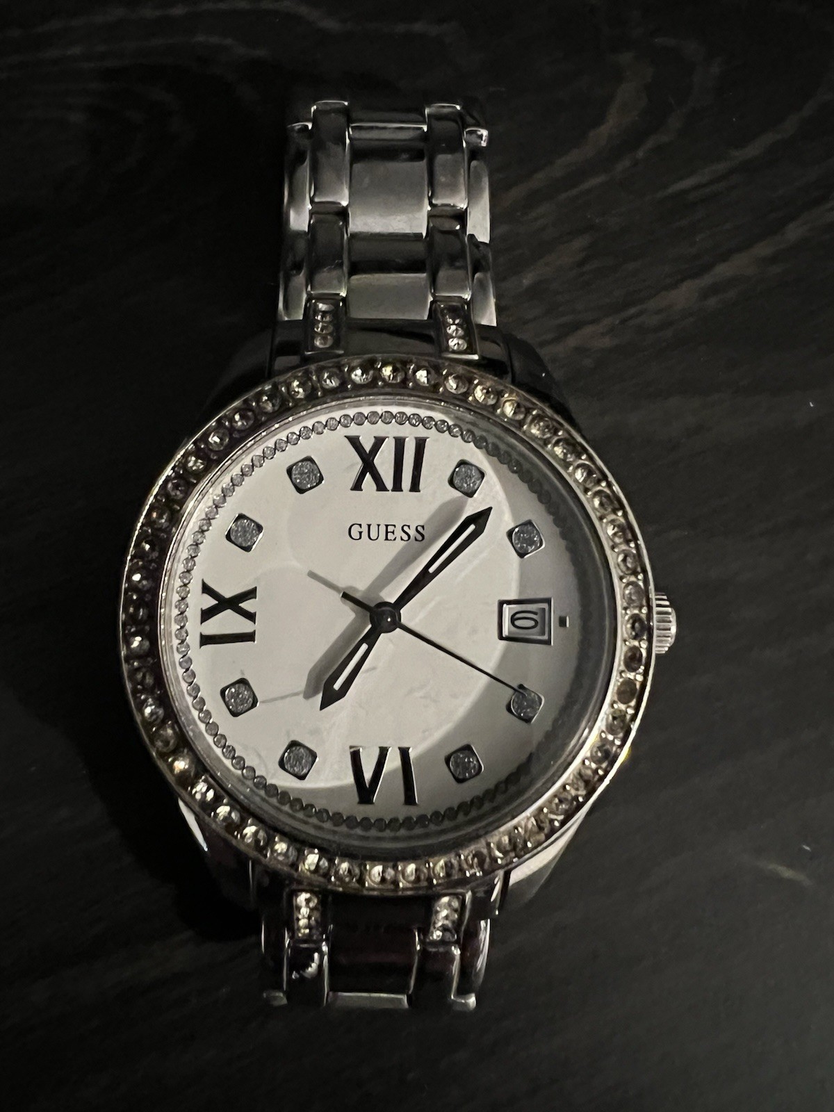 GUESS Women’s Silver Analog Roman Numeral Date Gem-Set Bezel Metal Bracelet