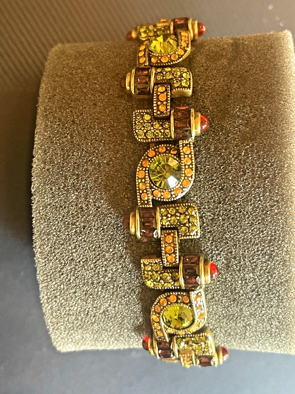 New Heidi Daus Bracelet in Original Packing. Olive Green, Red, Yellow Crystals.