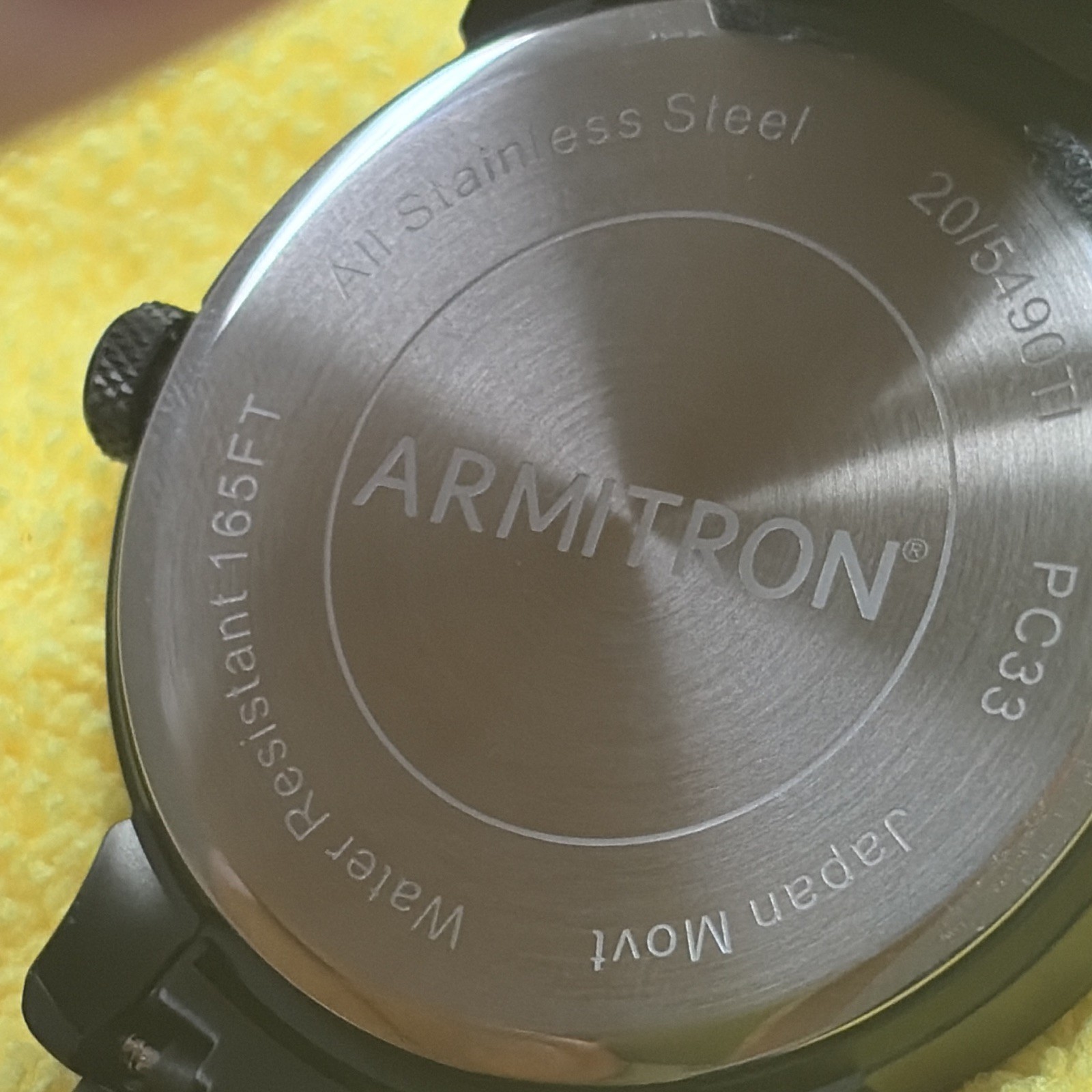 Armitron PC33 Quartz Day/Date Black Dial Steel Bracelet 43mm WR 165ft