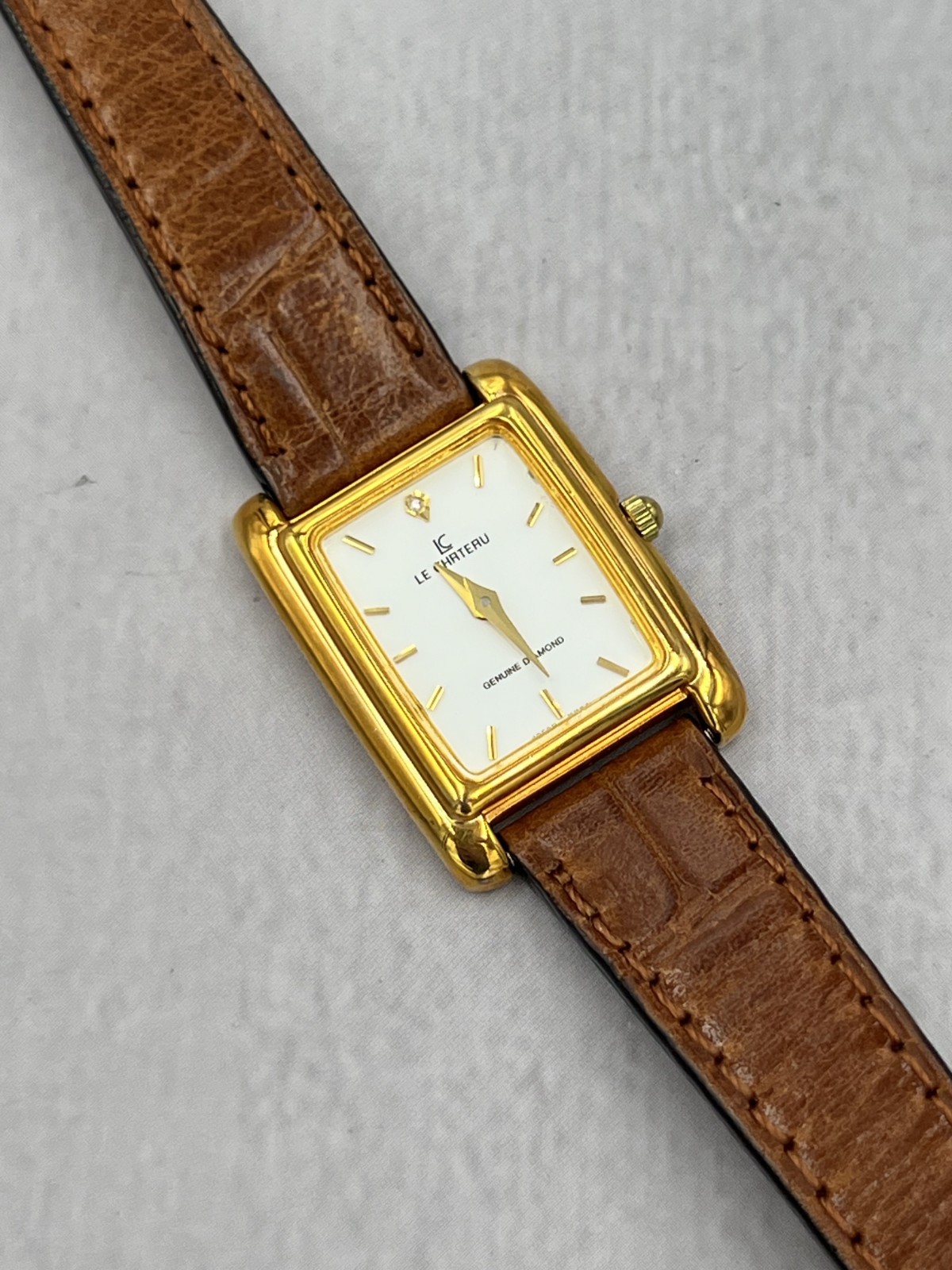 Le Chateau Women’s Maroon Leather Band White Dial Genuine Diamond Dress Watch