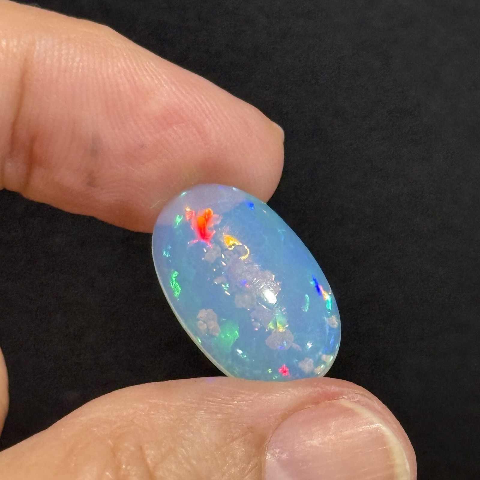6.10ct 20.7×12.7×4.7mm Fine Galaxy Pin Fire Ethiopian Welo Opal Oval Cabochon