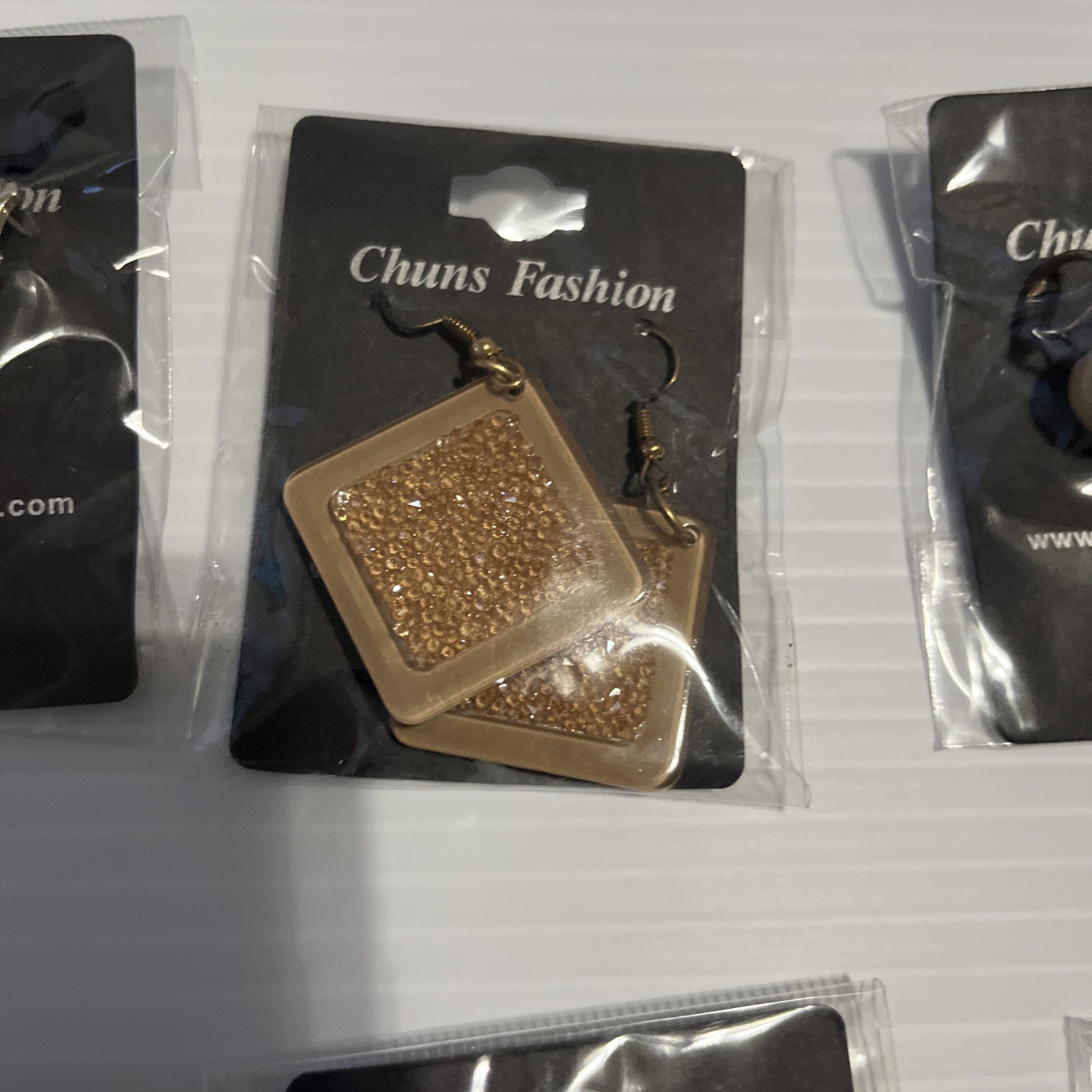 Lot of 140 Chuns Fashion Jewelry Earrings with different designs and colors