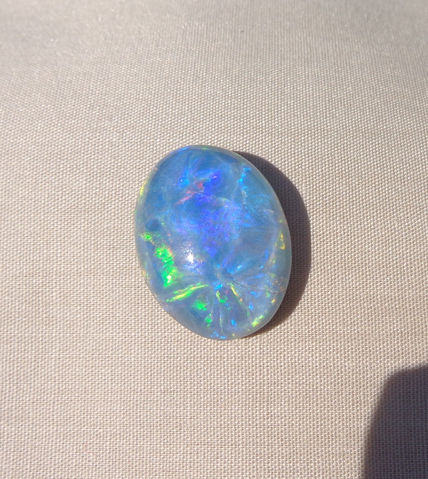 Spencer Idaho Opal Triplet 15X20mm with a Blazing Green Fire in a Galaxy Pattern