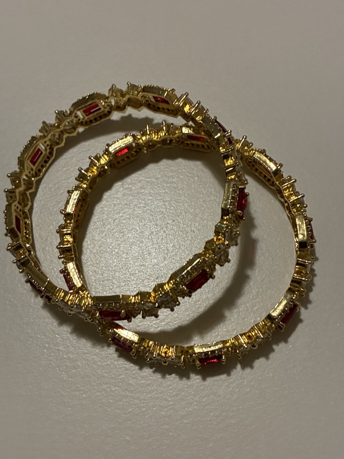 Gold Tone Bangle Bracelets Set with Red Emerald Cut and White Round Stones