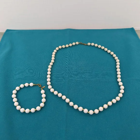 Vintage Monet white enamel bead necklace (24 in.) and bracelet (8 in.) set