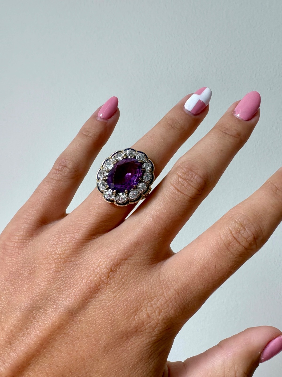 Antique Oval Amethyst & Diamond Halo Ring in Yellow Gold