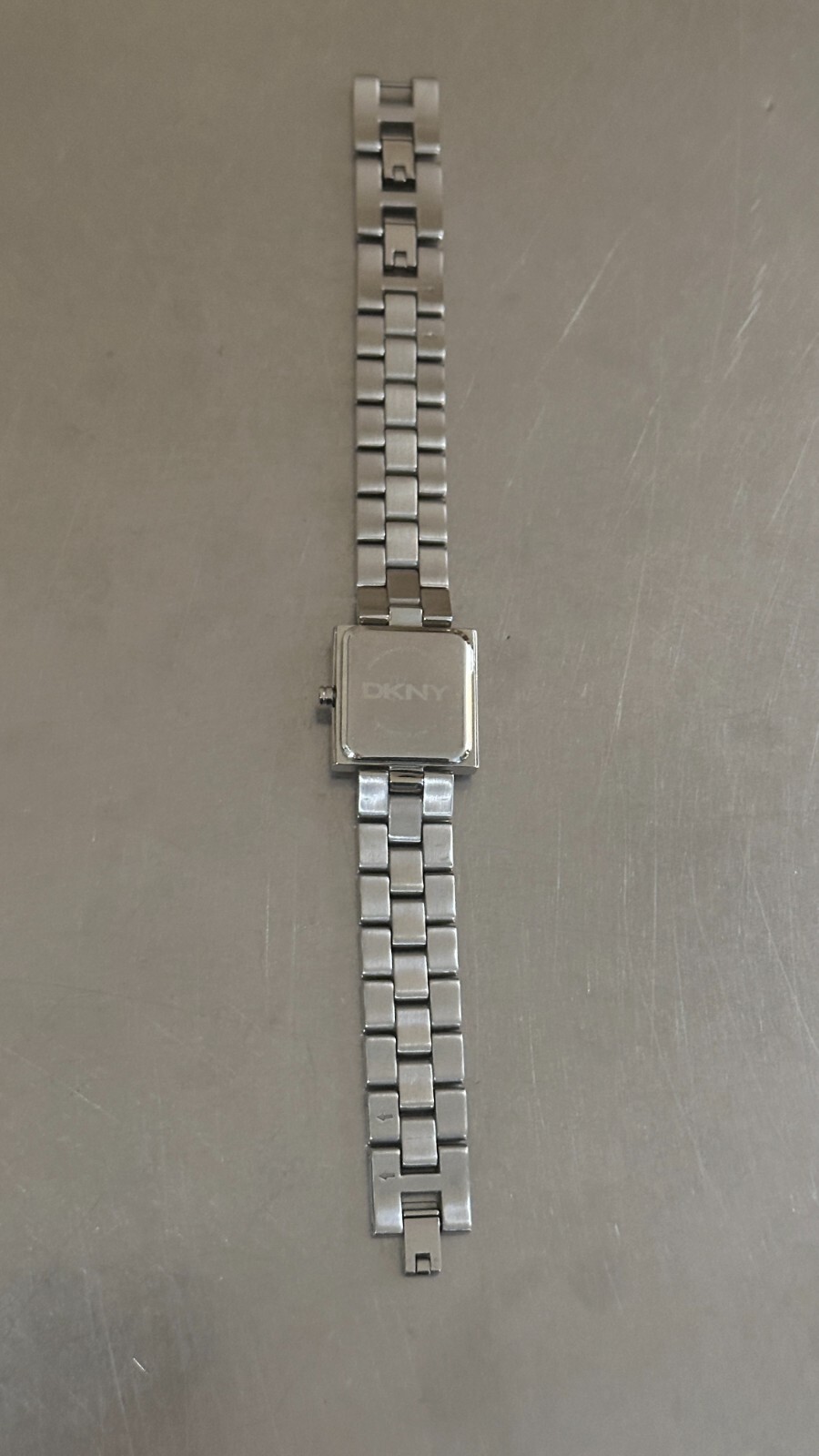 DKNY Watch Women’s Analog Square Silver Tone Quartz Water Resistant 7 inch 22 mm