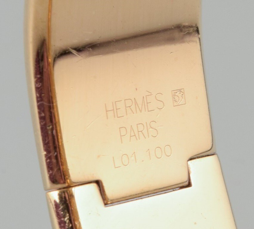 Hermes, ladies’ wristwatch. Made of gilded metal and enamel work.