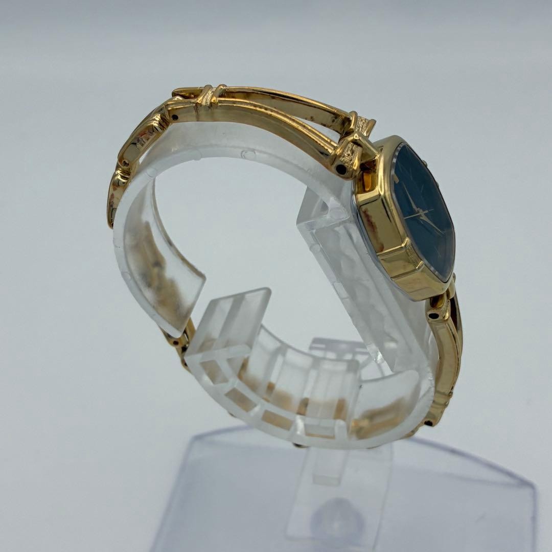 Working SEIKO wristwatch, gold and black, with new battery (A72)