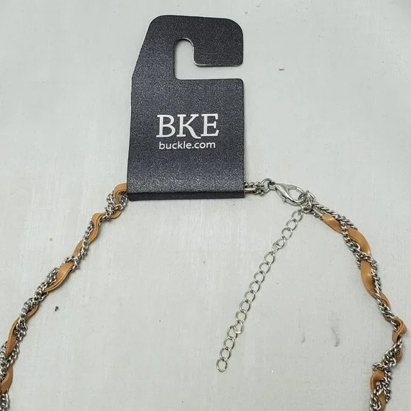 BKE tan leather with silver chain braided neck with hanging charms 27 inch NWT