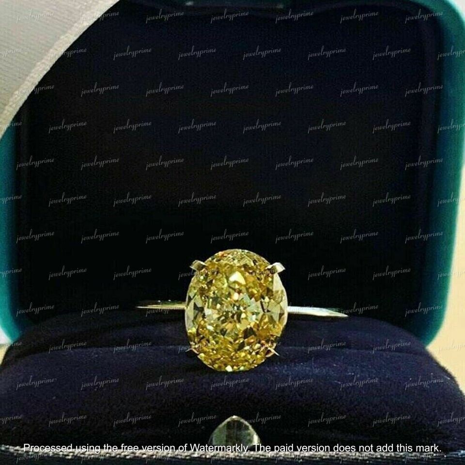 2Ct Oval Cut Lab-Created Canary Diamond Engagement Ring 14K Yellow Gold Finish