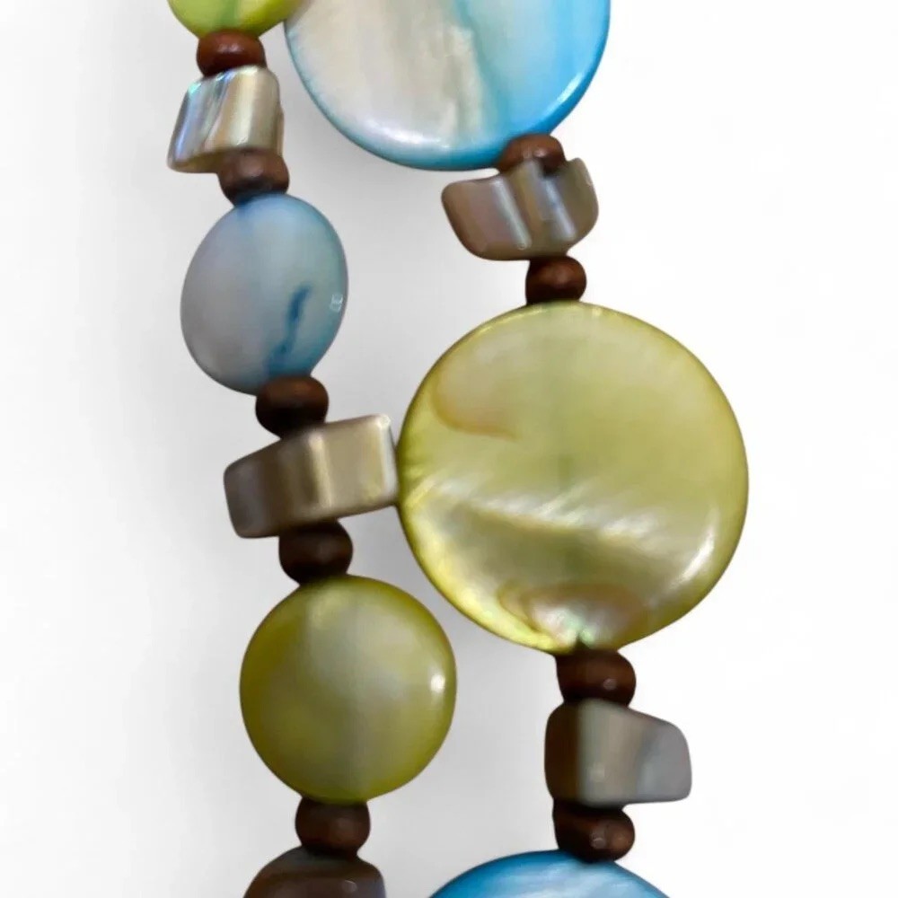 Vintage layered beaded necklace in shades of blue, green, and earthy brown