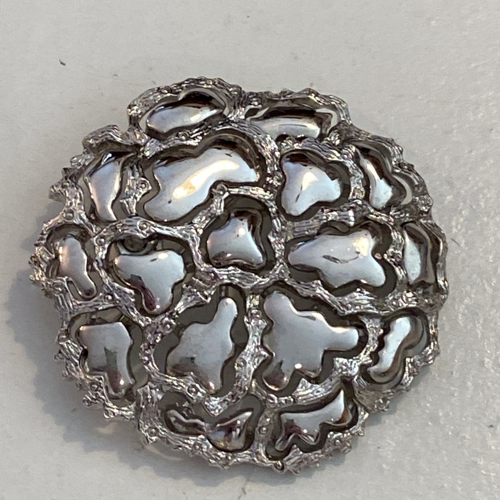 Vintage Roget TM Silver Tone Metal Modernist Perforated Pattern Branch Shiny Pin