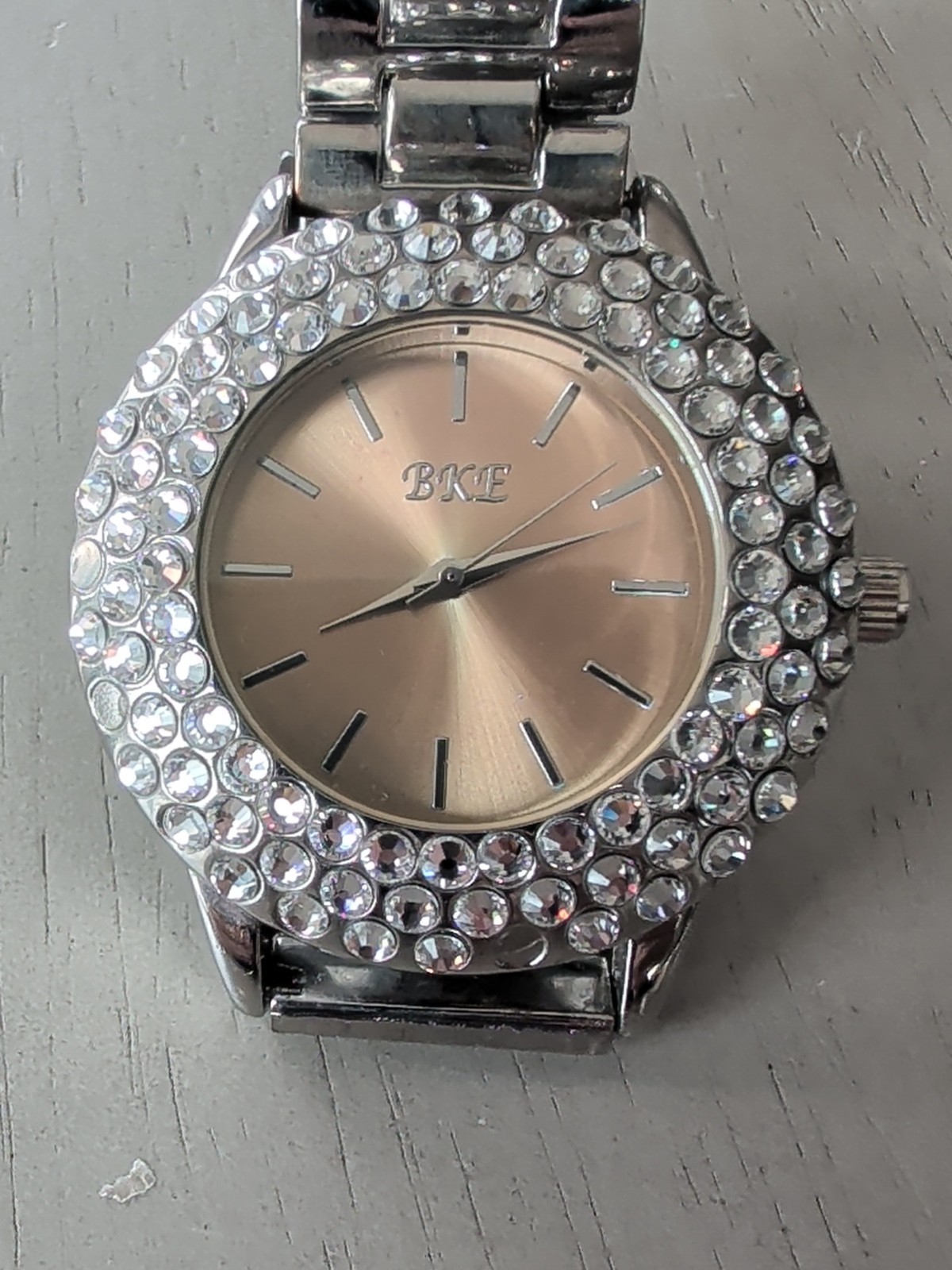 BKE Buckle Watch Women’s ROSE Tone Crystal Accent Bling New battery 6.5″ Band