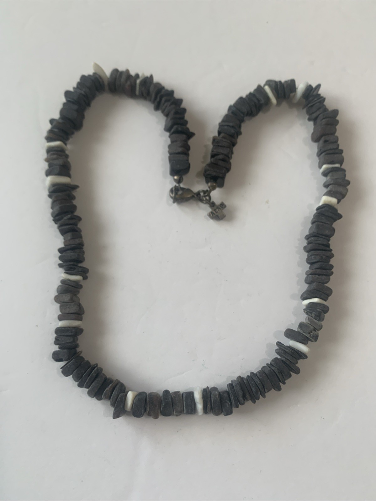 Vintage Aeropostale (AERO 1987y) beaded bracelet with a cross charm. N57