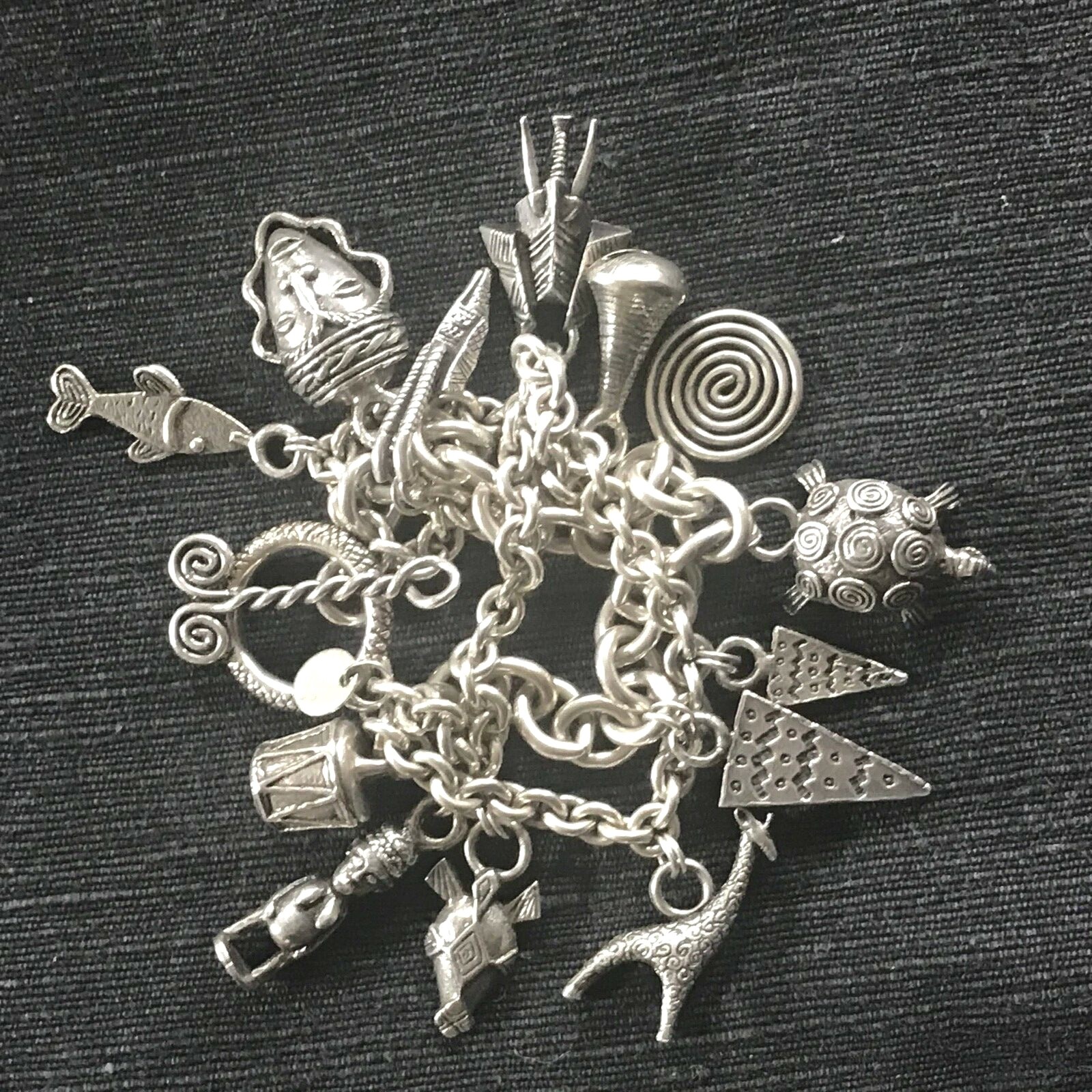SUSAN CUMMINGS. SS 3 ROW HEAVY LINK BRACELET. 170 GRAMS. ENDANGERED SPECIES