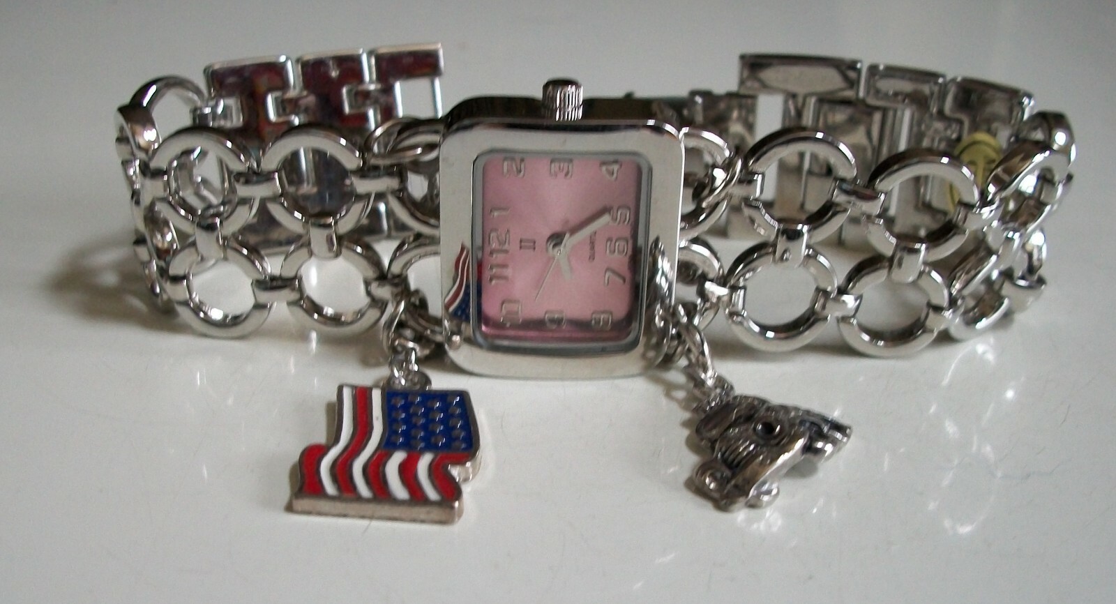 Women’s silver dangling charm bracelet American Flag fashion casual fun watch